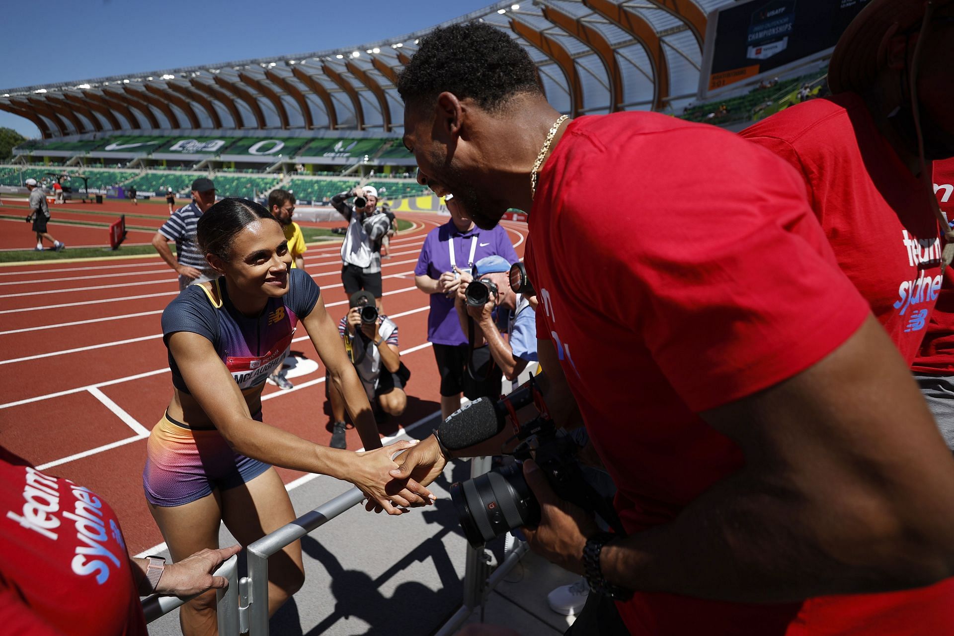 Sydney McLaughlin and Andre Levrone (Photo by Steph Chambers/Getty Images)