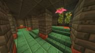 The trial chambers in this Minecraft seed have meshed with a lush cave (Image via Mojang)