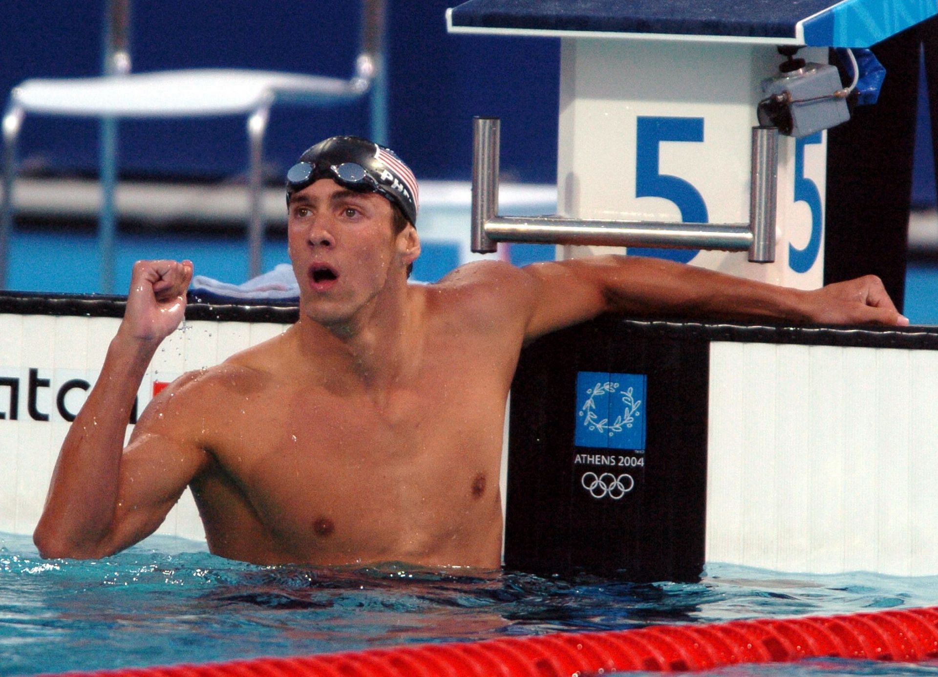 Michael Phelps from the USA celebrates winning gol