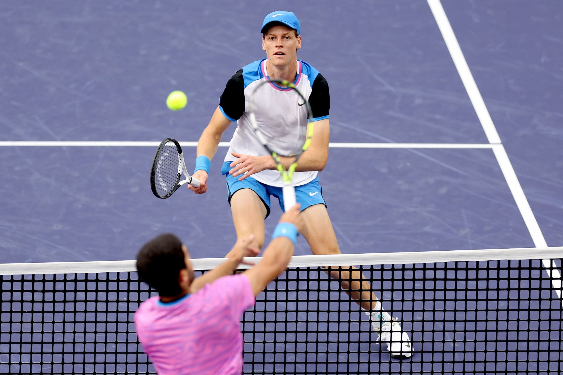 Carlos Alcaraz and Jannik Sinner in action at Indian Wells Masters 2024