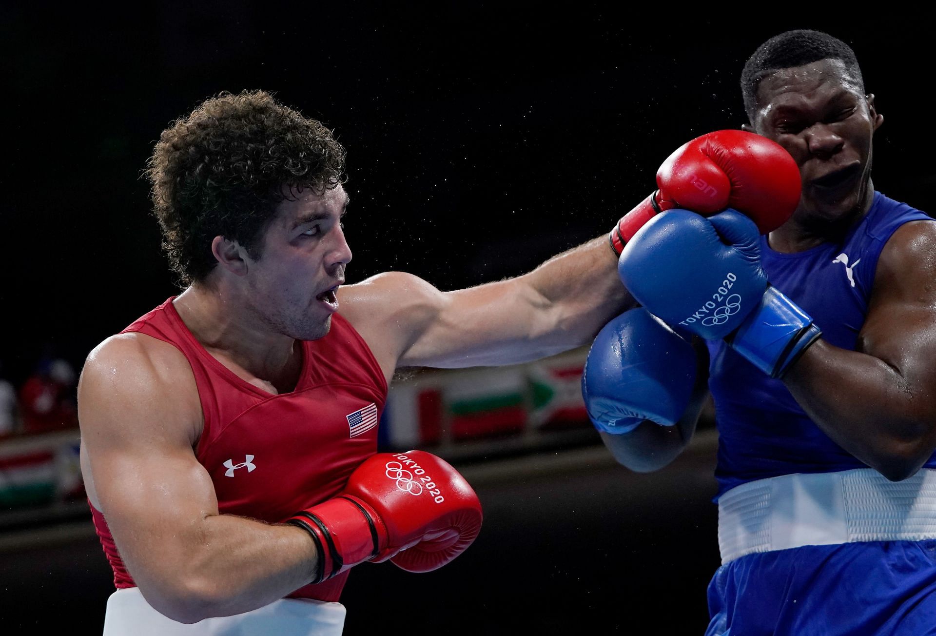 Richard Torrez Junior (red) of Team United States exchanges punches with Dainier Pero of Team Cuba during the Men&#039;s Super Heavy (+91kg) semi final on day nine of the Tokyo 2020 Olympic Games at Kokugikan Arena on August 01, 2021 in Tokyo, Japan. (Photo by Themba Hadebe - Pool/Getty Images)