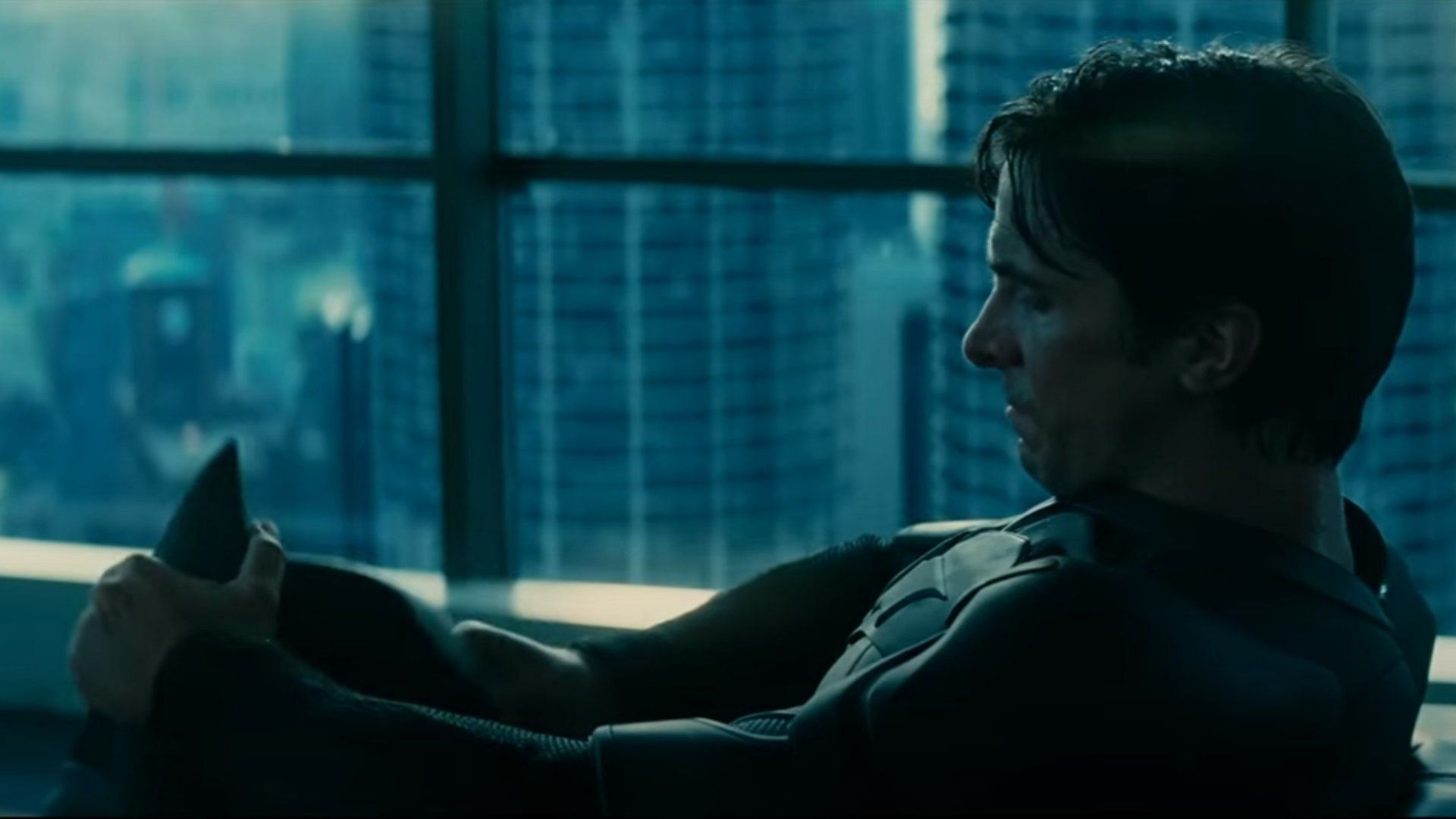 Christian Bale seen in The Dark Knight (Image via DC, The Dark Knight trailer, 01:29)
