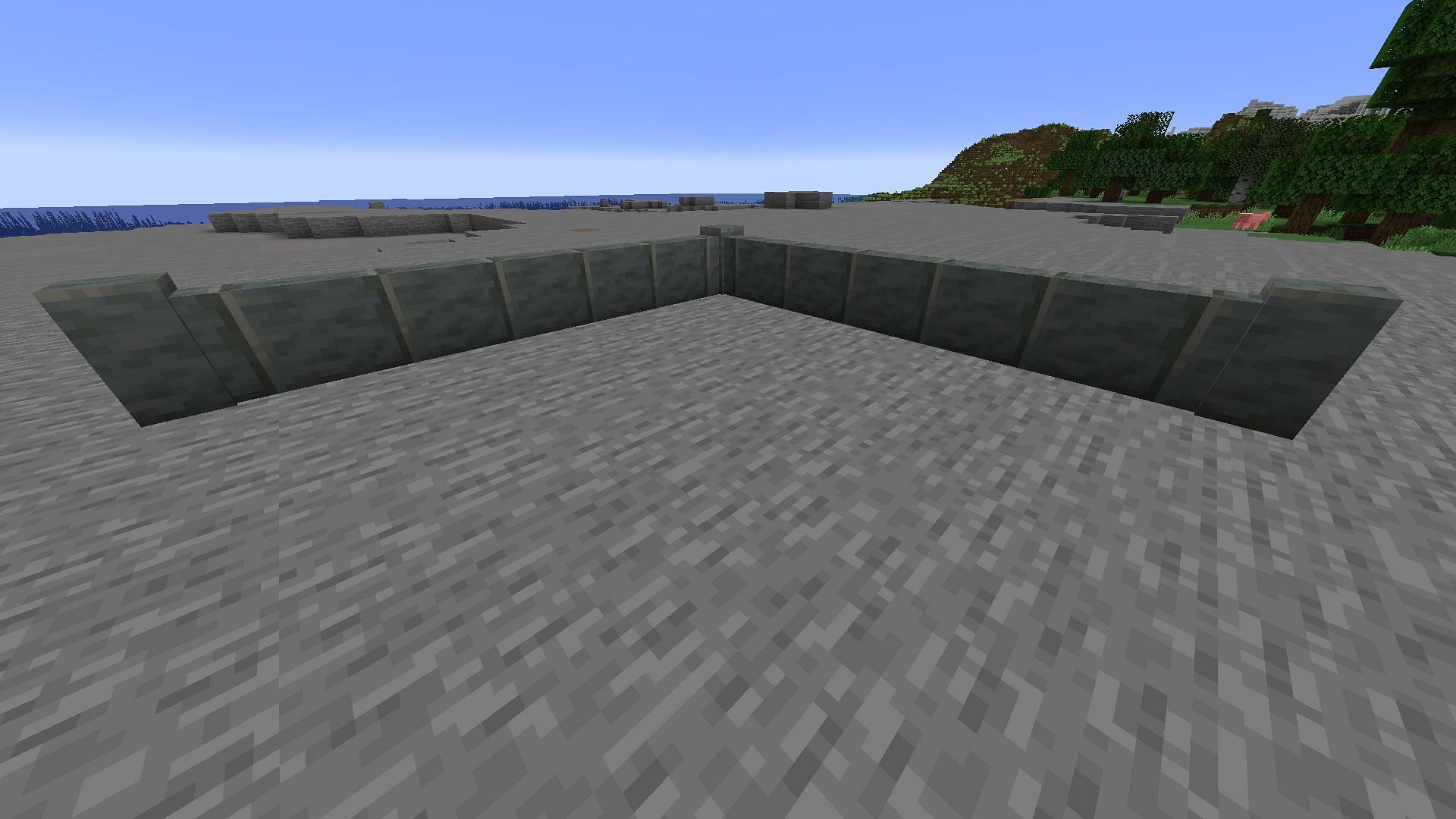 Polished tuff walls complement Minecraft builds that use stone blocks magnificently (Image via Mojang)