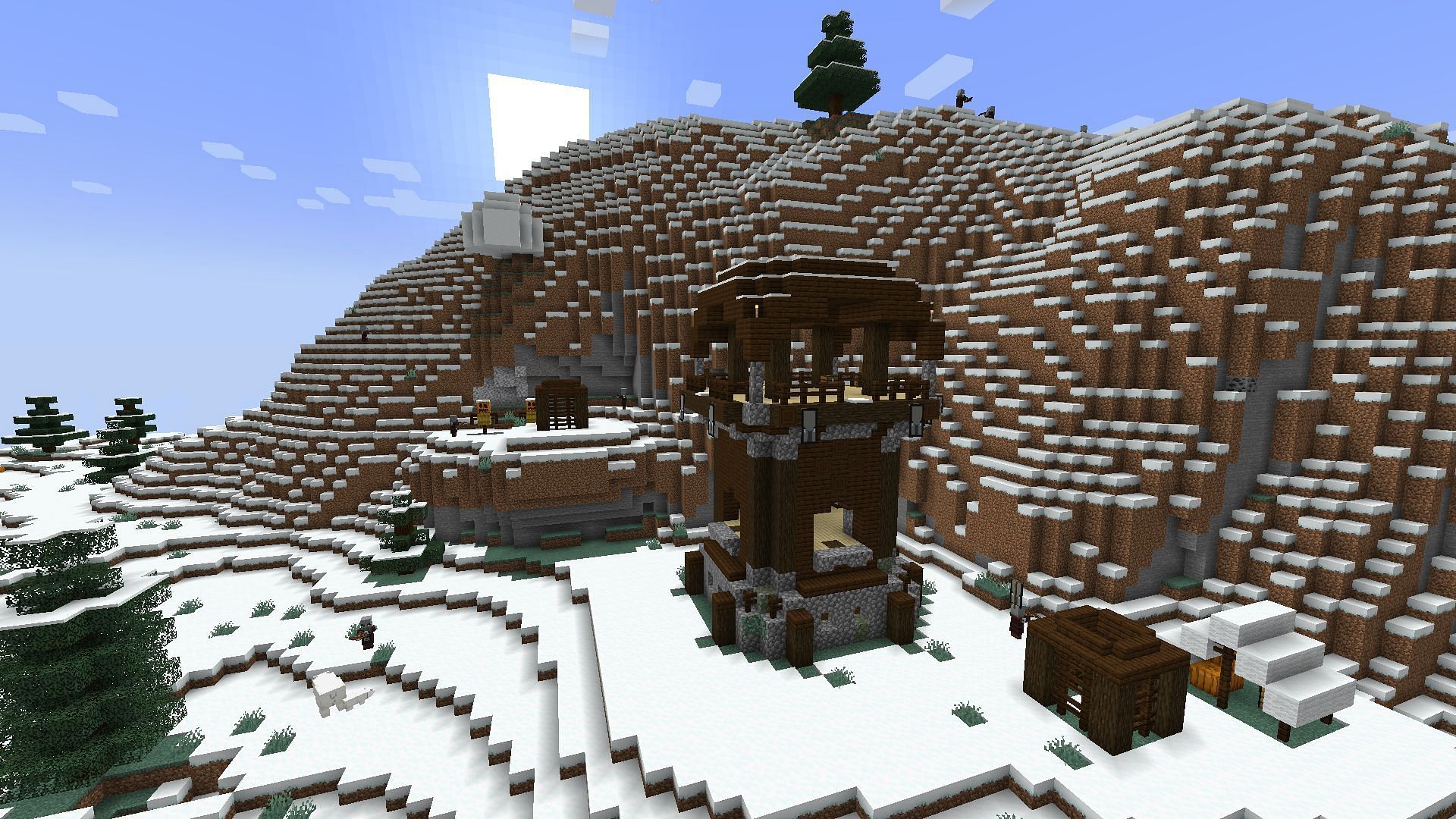 A pillager hut with a nearby igloo (Image via Mojang)