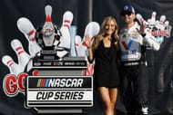 NASCAR Cup Series Go Bowling at The Glen WATKINS GLEN, NEW YORK - AUGUST 20: William Byron, driver of the #24 Valvoline Chevrolet, and Erin Blaney celebrate in victory lane after winning the NASCAR Cup Series Go Bowling at The Glen at Watkins Glen International on August 20, 2023 in Watkins Glen, New York. (Photo by Chris Graythen/Getty Images)