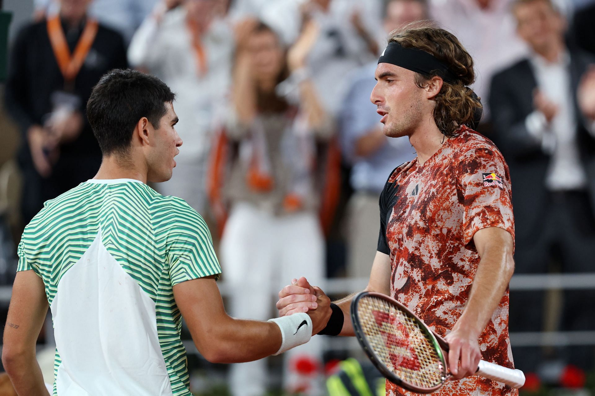 Carlos Alcaraz and Stefanos Tsitsipas at the net after their French Open 2023 clash