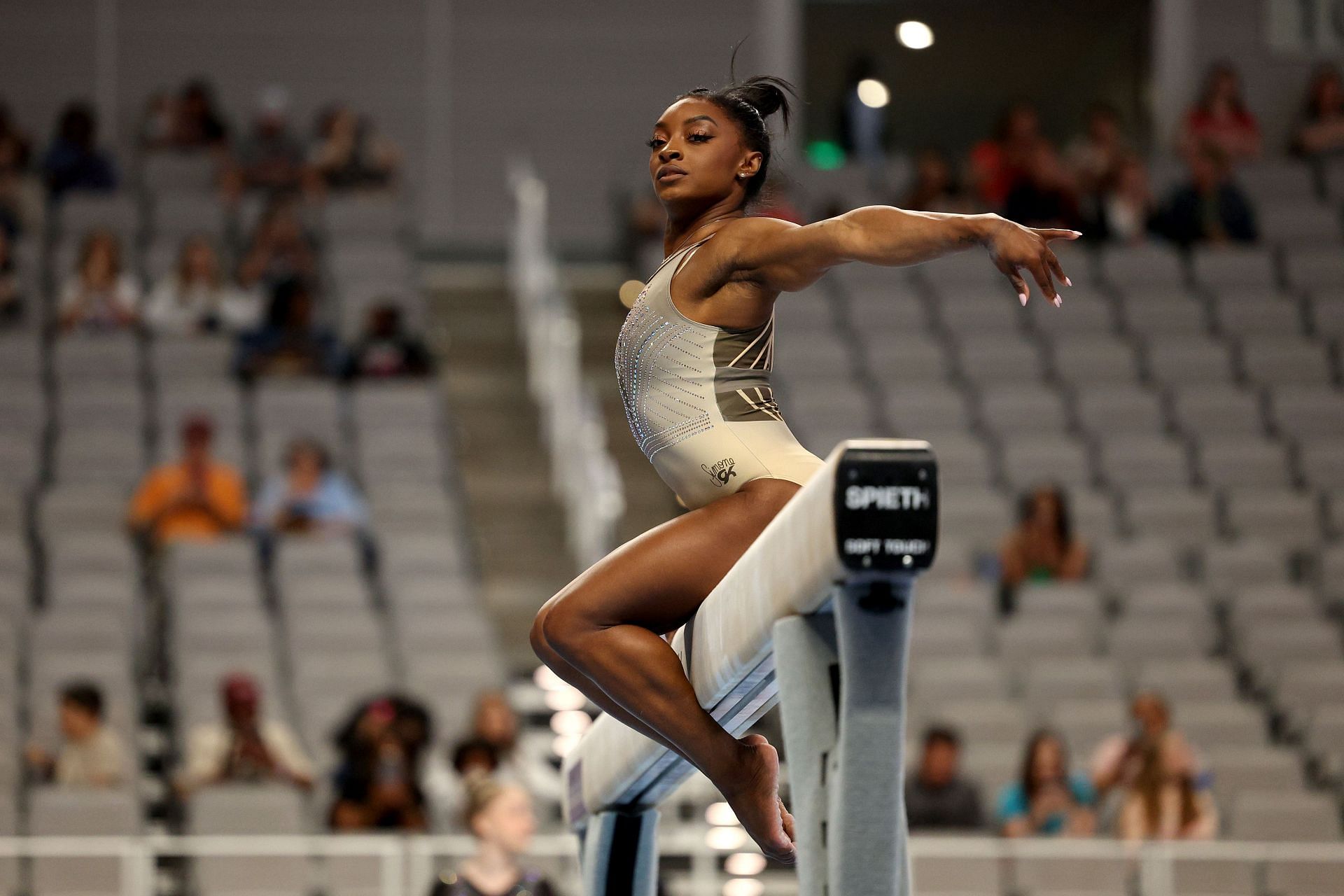 Simone Biles warms up on the balance beam before the 2024 Xfinity U.S. Gymnastics Championships in Fort Worth, Texas.