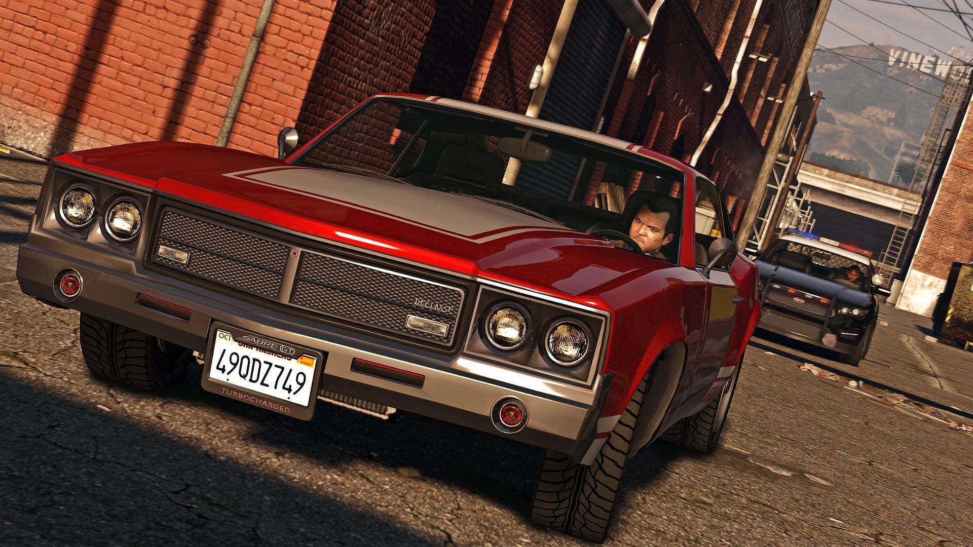 Michael driving the Sabre Turbo in Grand Theft Auto 5 (Image via Rockstar Games)