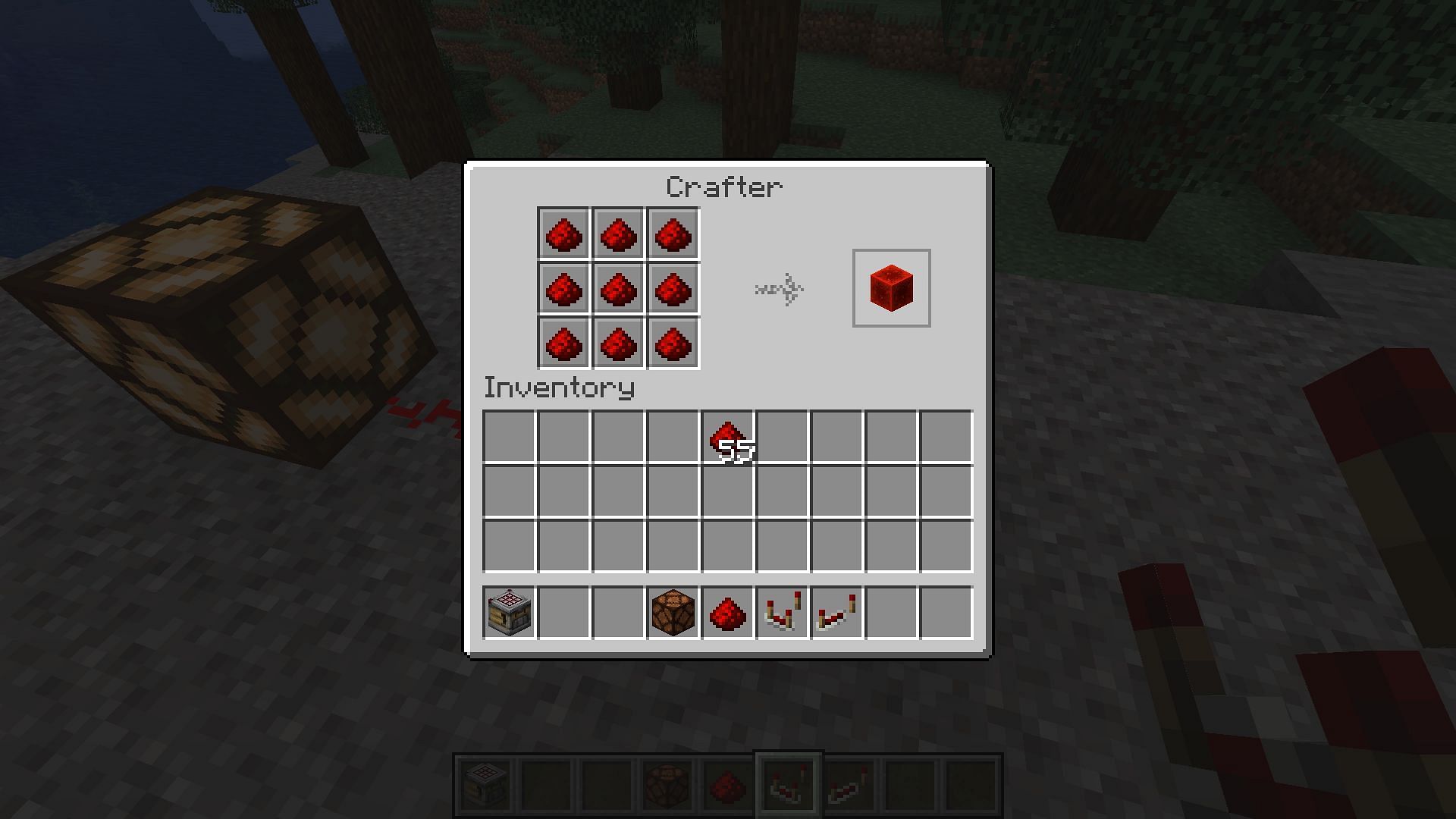 A redstone lamp being lit up by a crafter using a comparator (Image via Mojang)