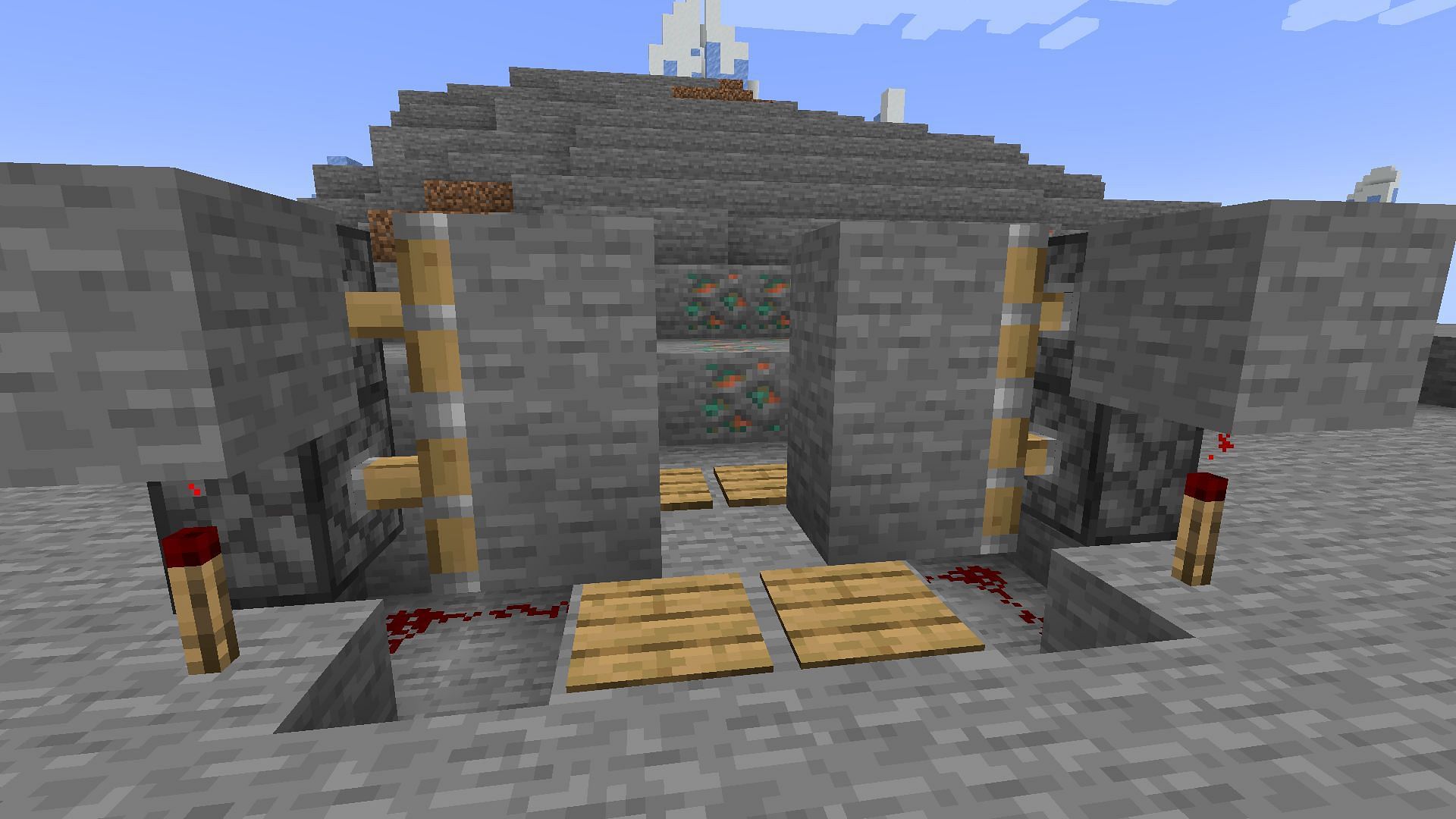 A basic two by two piston door opening (Image via Mojang)