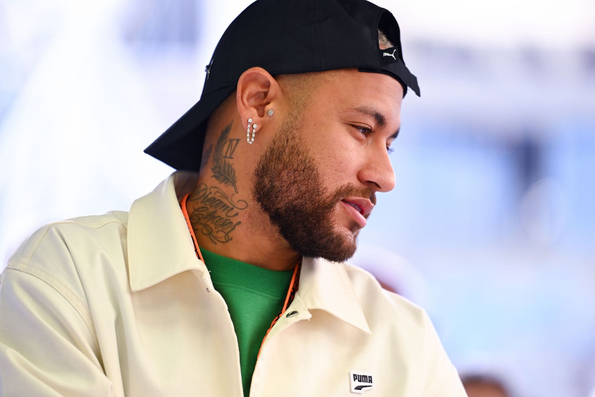 BAHRAIN, BAHRAIN - MARCH 02: Neymar is given a tour of the Visa Cash App RB garage prior to the F1 Grand Prix of Bahrain at Bahrain International Circuit on March 02, 2024 in Bahrain, Bahrain. (Photo by Rudy Carezzevoli/Getty Images)