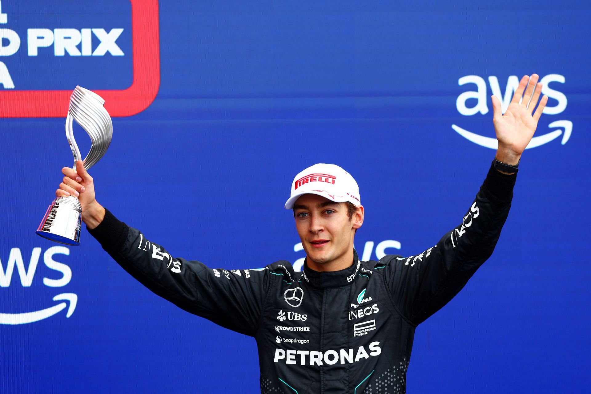 F1 Grand Prix of Canada MONTREAL, QUEBEC - JUNE 09: Third-placed George Russell of Great Britain and Mercedes celebrates with his trophy on the podium after the F1 Grand Prix of Canada at Circuit Gilles Villeneuve on June 09, 2024 in Montreal, Quebec. (Photo by Clive Rose/Getty Images)