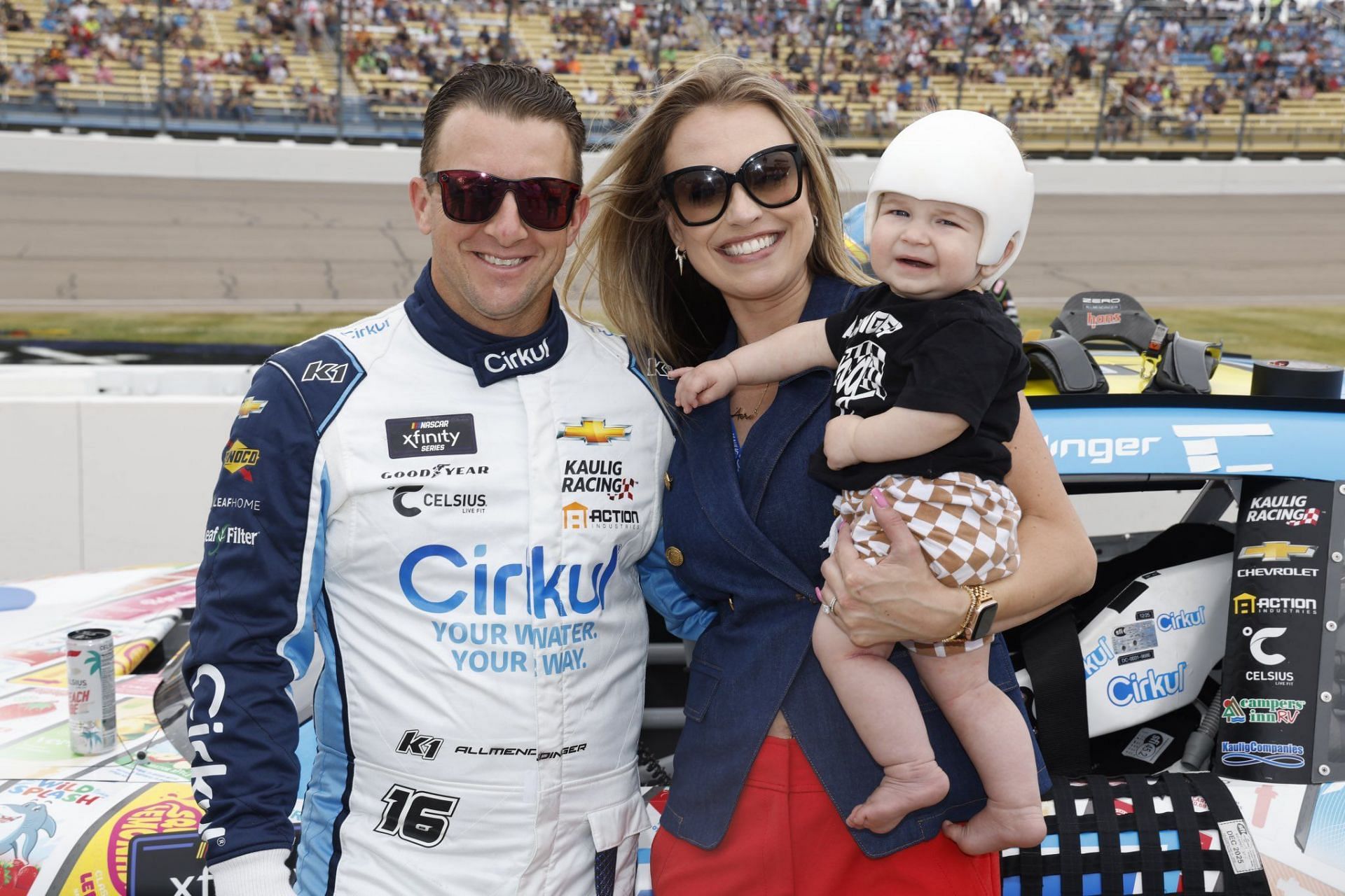 AJ Allmendinger with his wife, Tara Allmendinger and son, Aero 