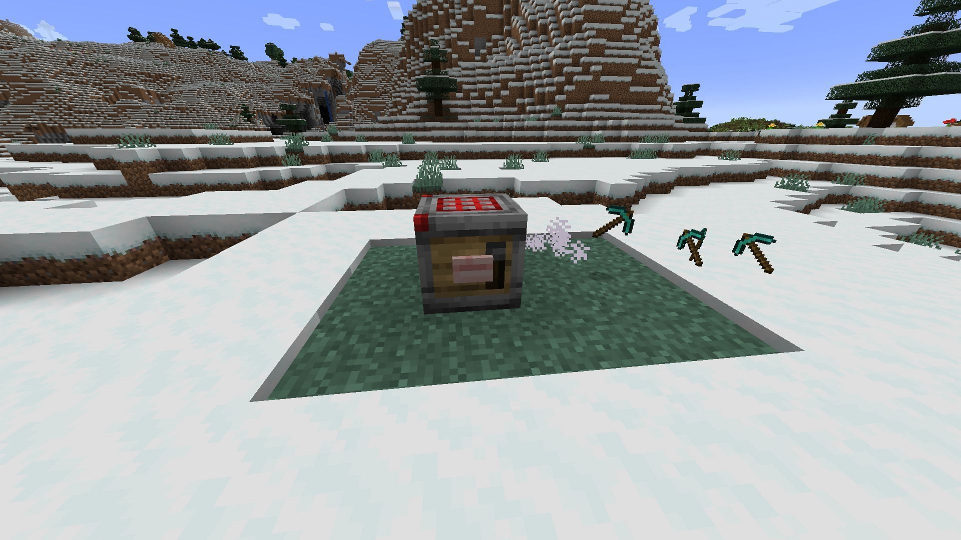 A basic crafter in Minecraft 1.21 that crafts diamond pickaxes when its button is pressed (Image via Mojang)