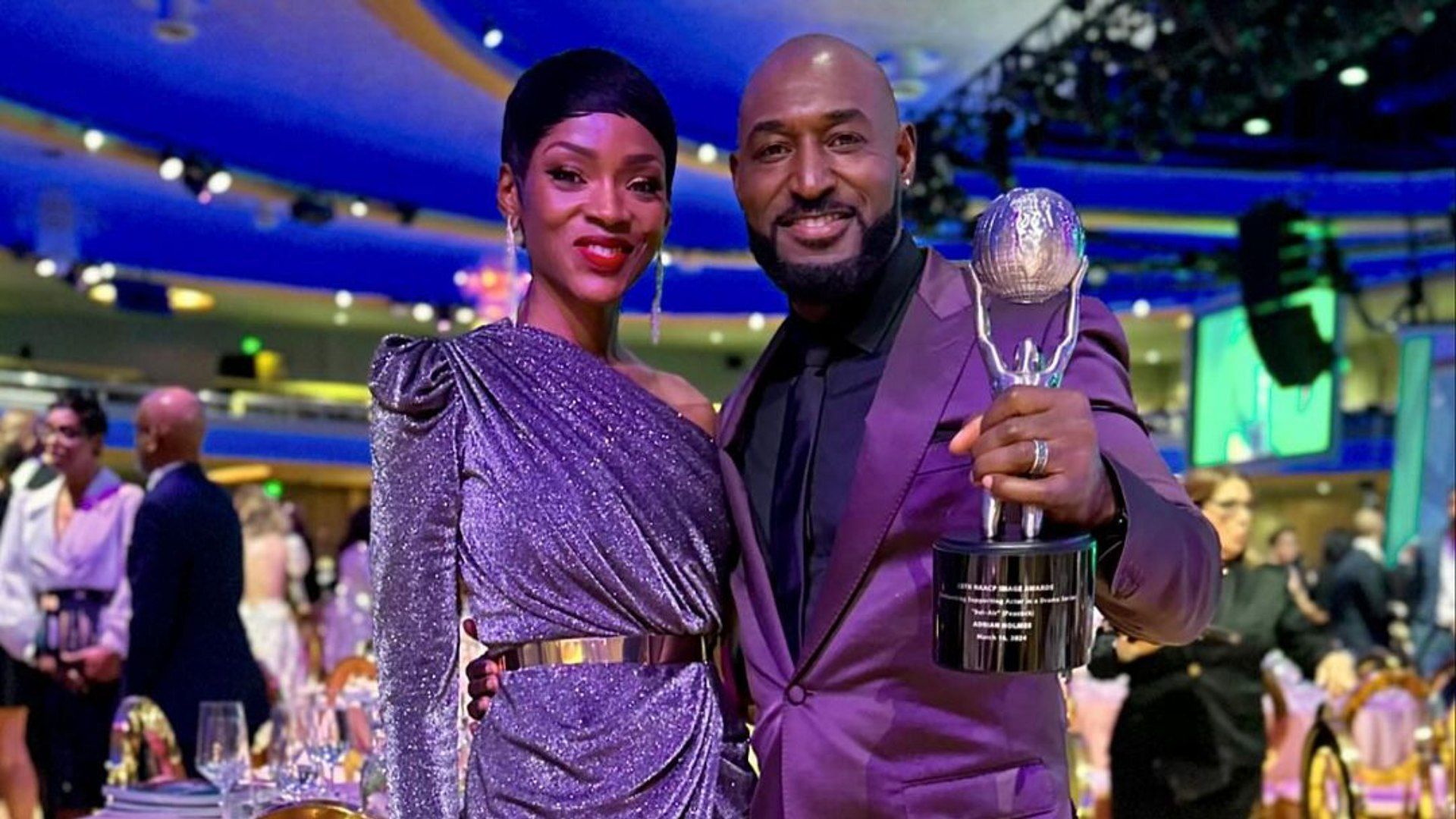 Adrian Holmes&#039; wife seen posing with him and his award at the NAACP Image Awards in 2024 (Image via Instagram/Adrianholmes)