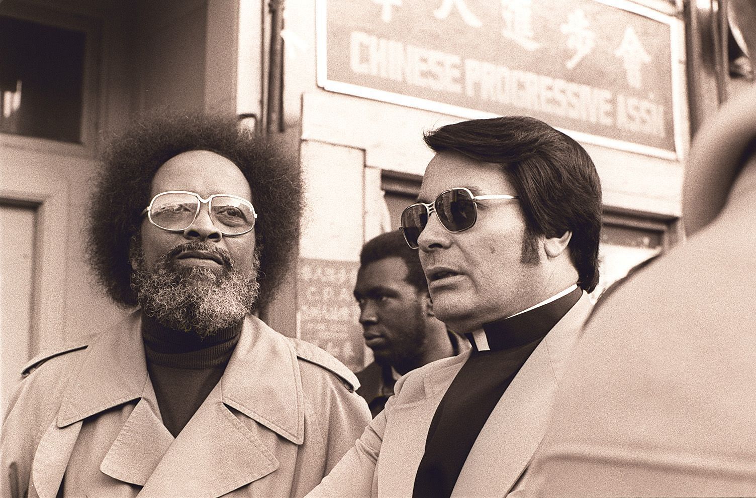 Jim Jones at a protest (Image via Wikimedia Commons)