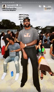 Marcus rocks an all-black ensemble at the Amiri fashion show