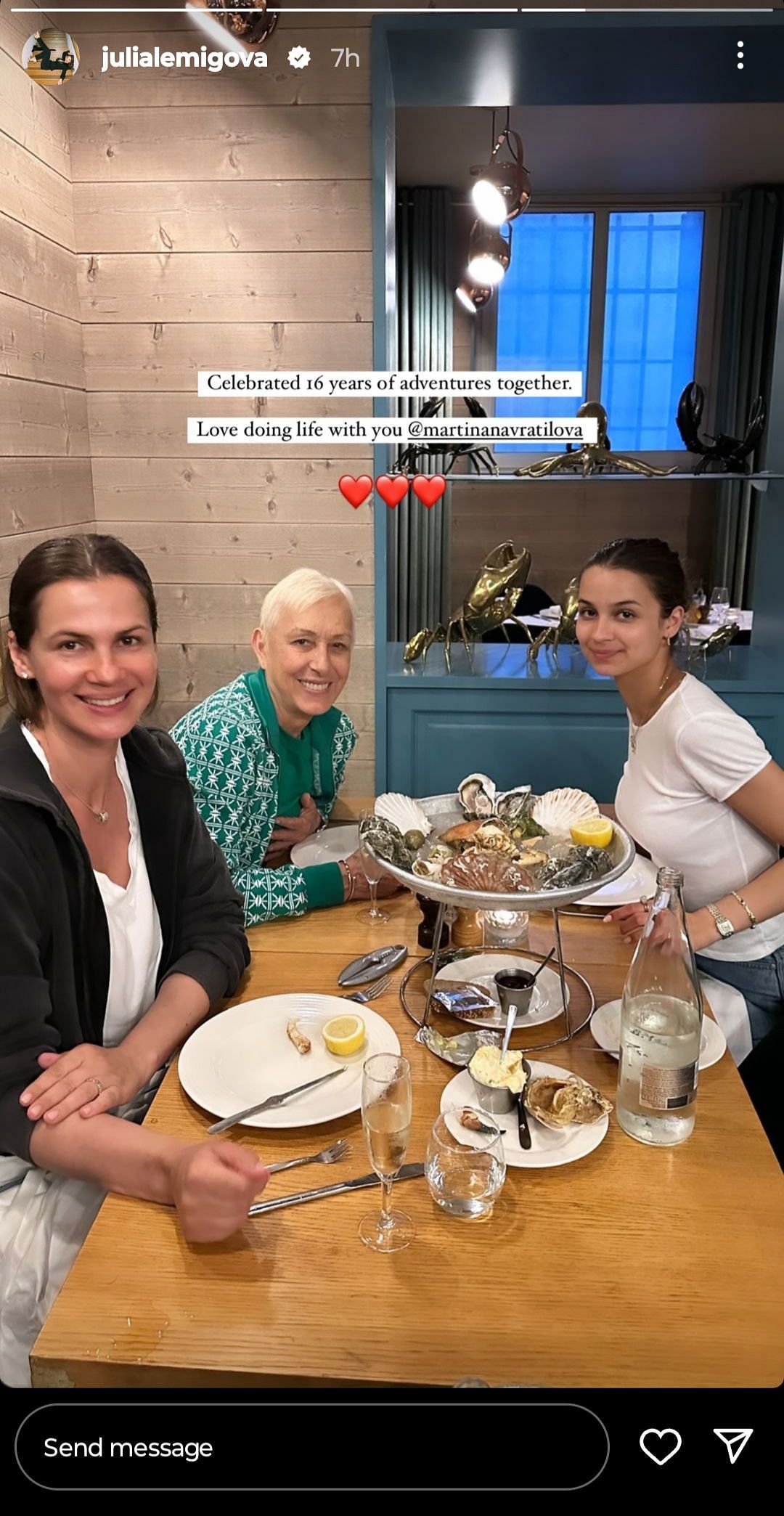 Navratilova, Lemigova, and Lemigova&#039;s daughter Emma at a Paris restaurant