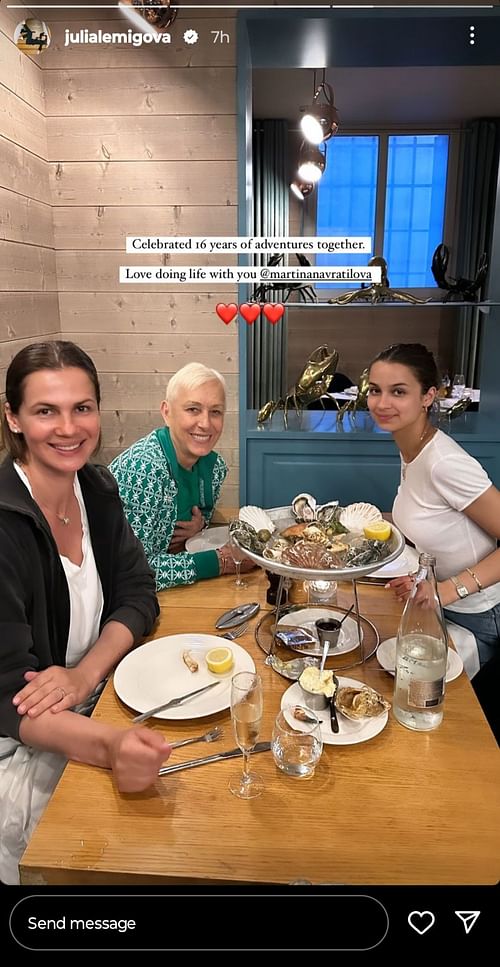 Navratilova, Lemigova, and Lemigova's daughter Emma at a Paris restaurant