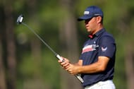 Gary Woodland lines up a putt on the 12th green during the first round of the 124th U.S. Open