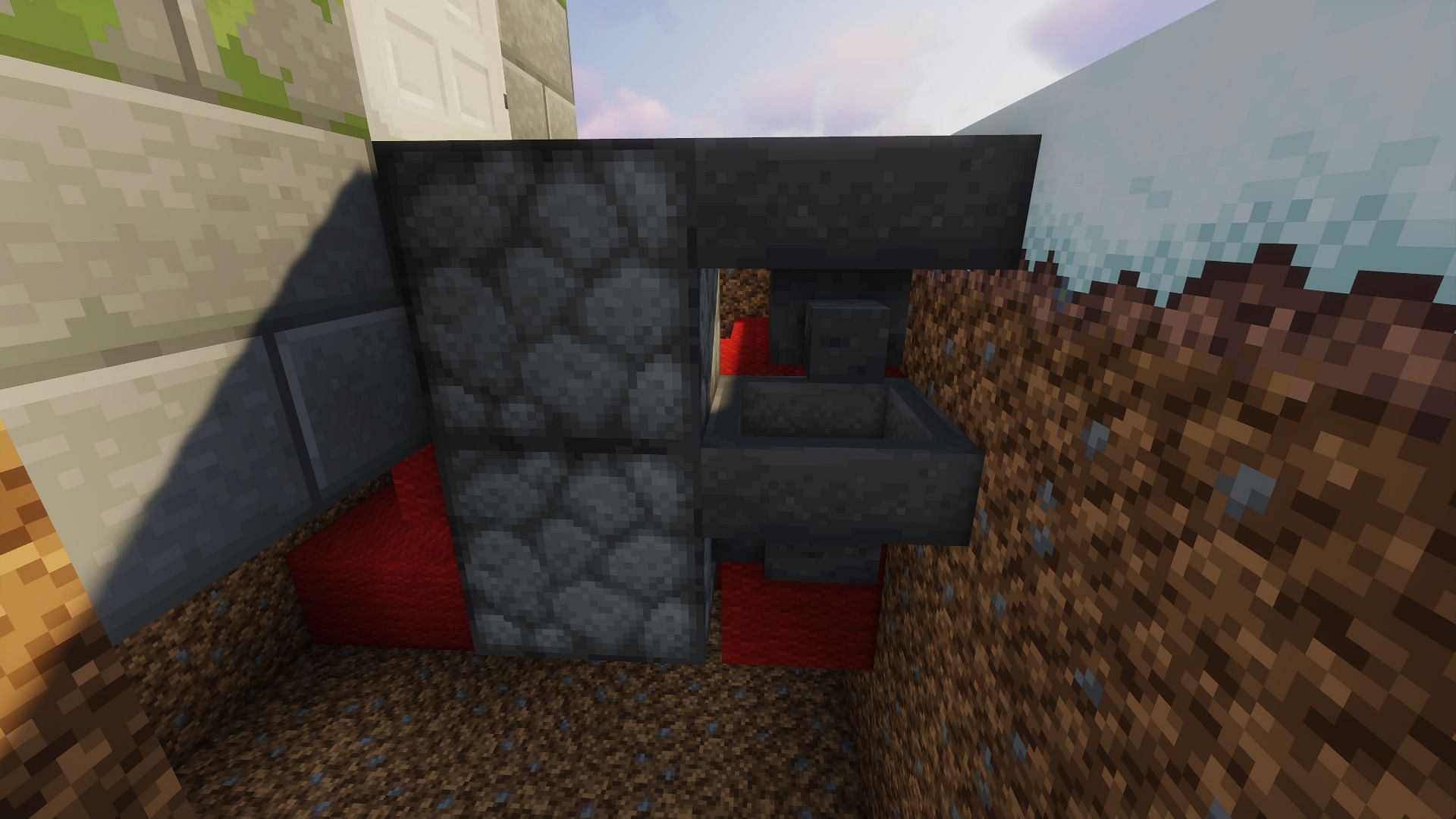 Hoppers used as part of a door build (Image via Mojang)