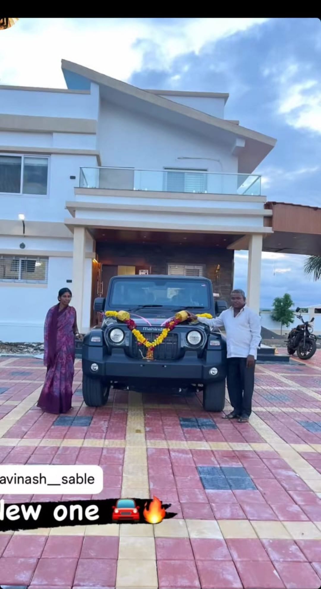 Avinash Sable&#039;s parents with the car. (Image Credit: Instagram)