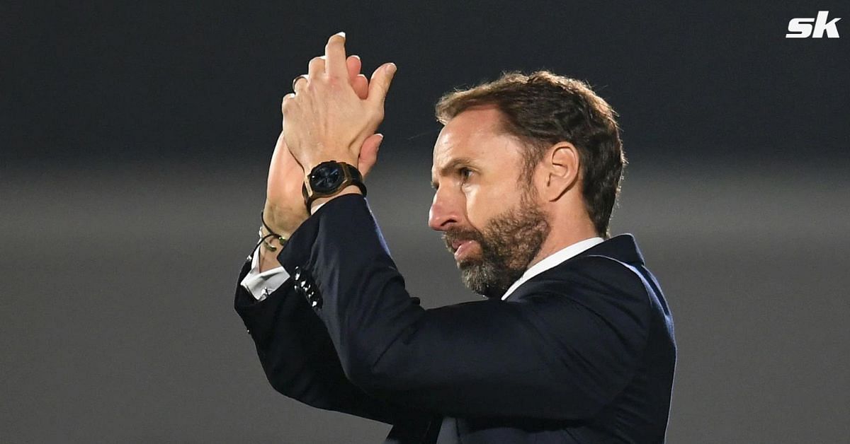 England manager Gareth Southgate looks on.