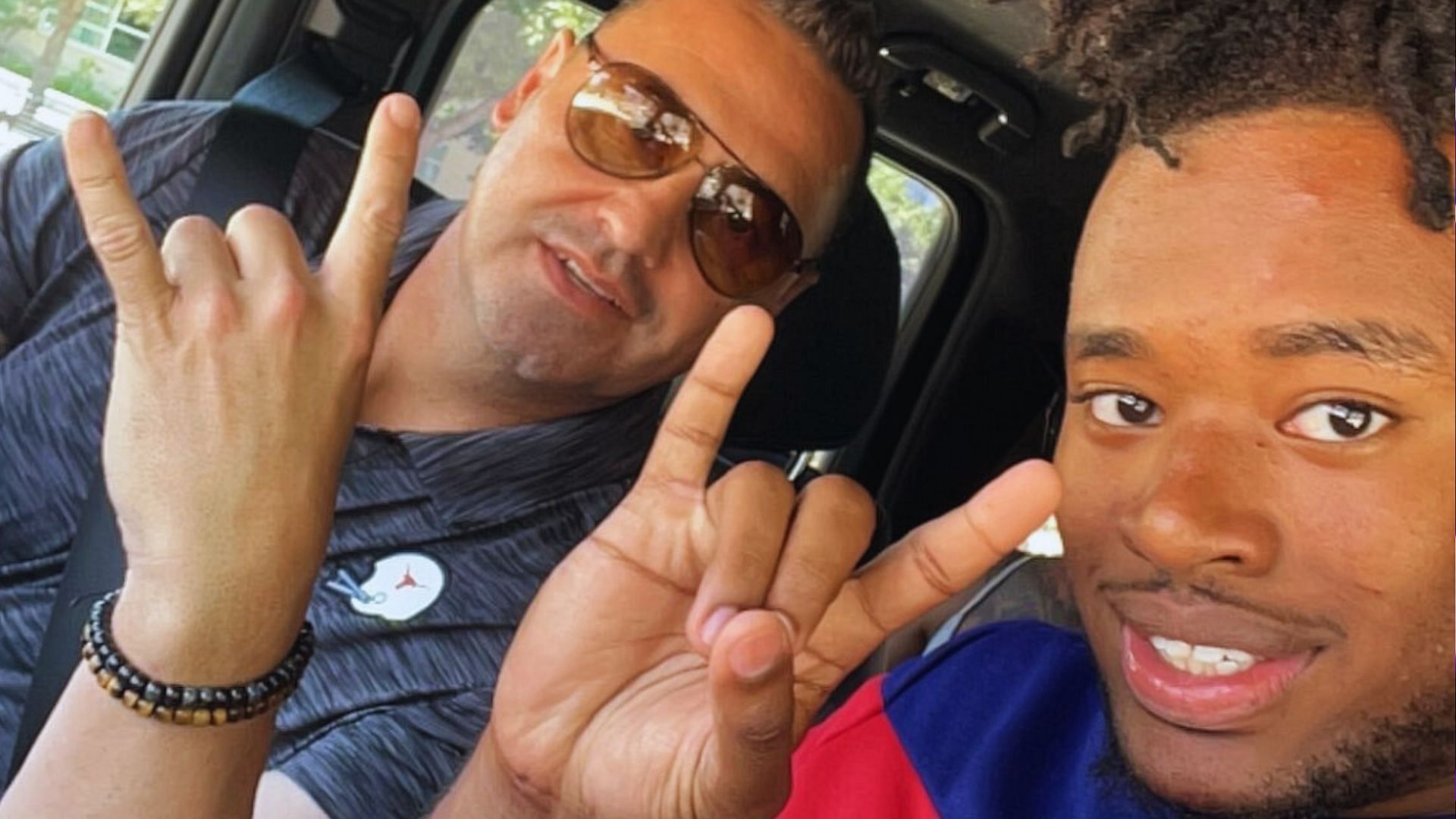 Javion Hilson with Texas head coach Steve Sarkisian (Credit- X/Javion_hilson)