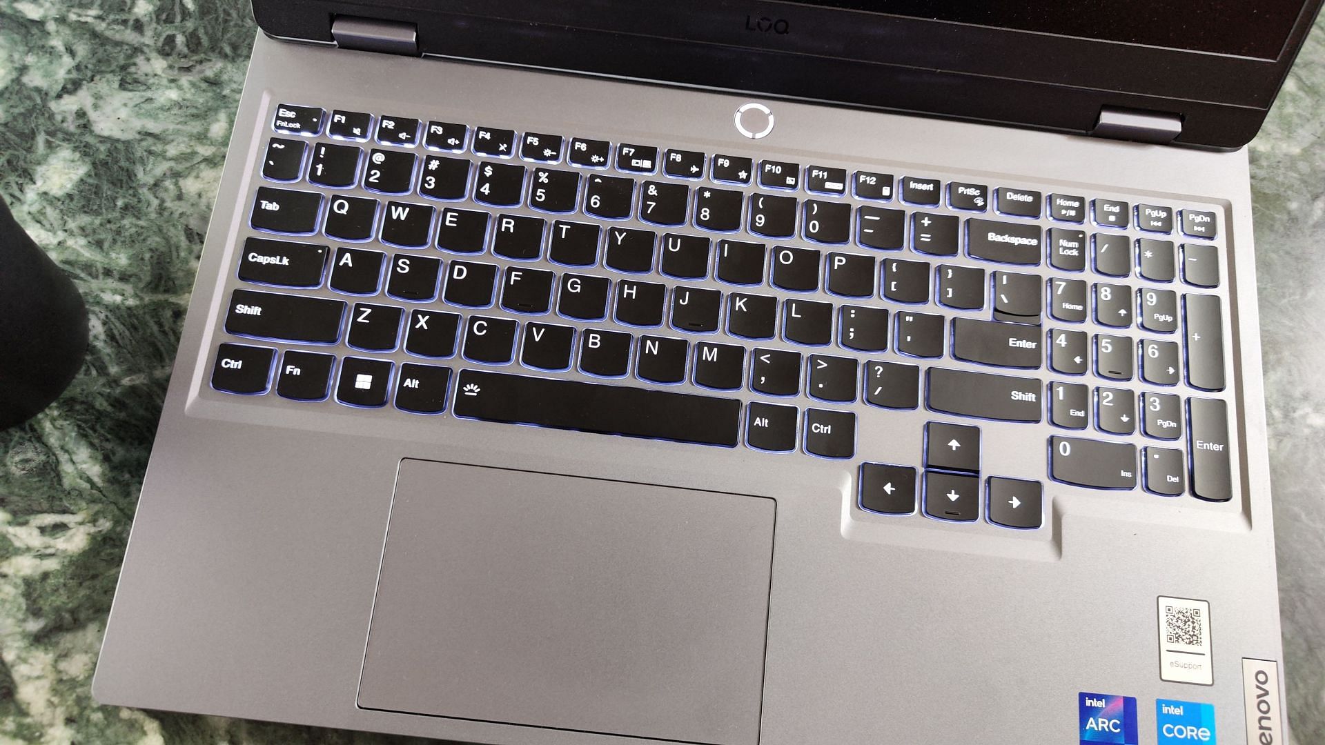 The keyboard and trackpad on the LOQ 15 is quite decent (Image via Sportskeeda)