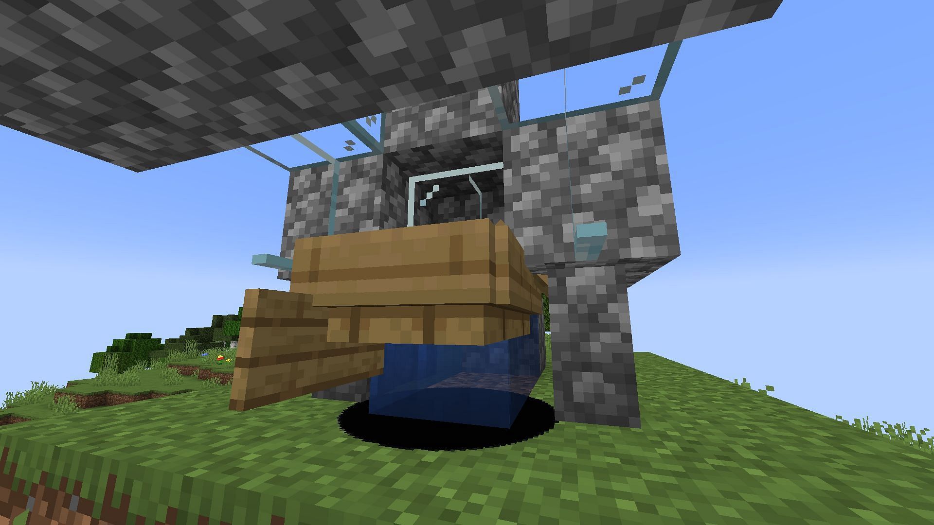 Break the bottom-most boat as the last part to finish the elytra launcher (Image via Mojang Studios)