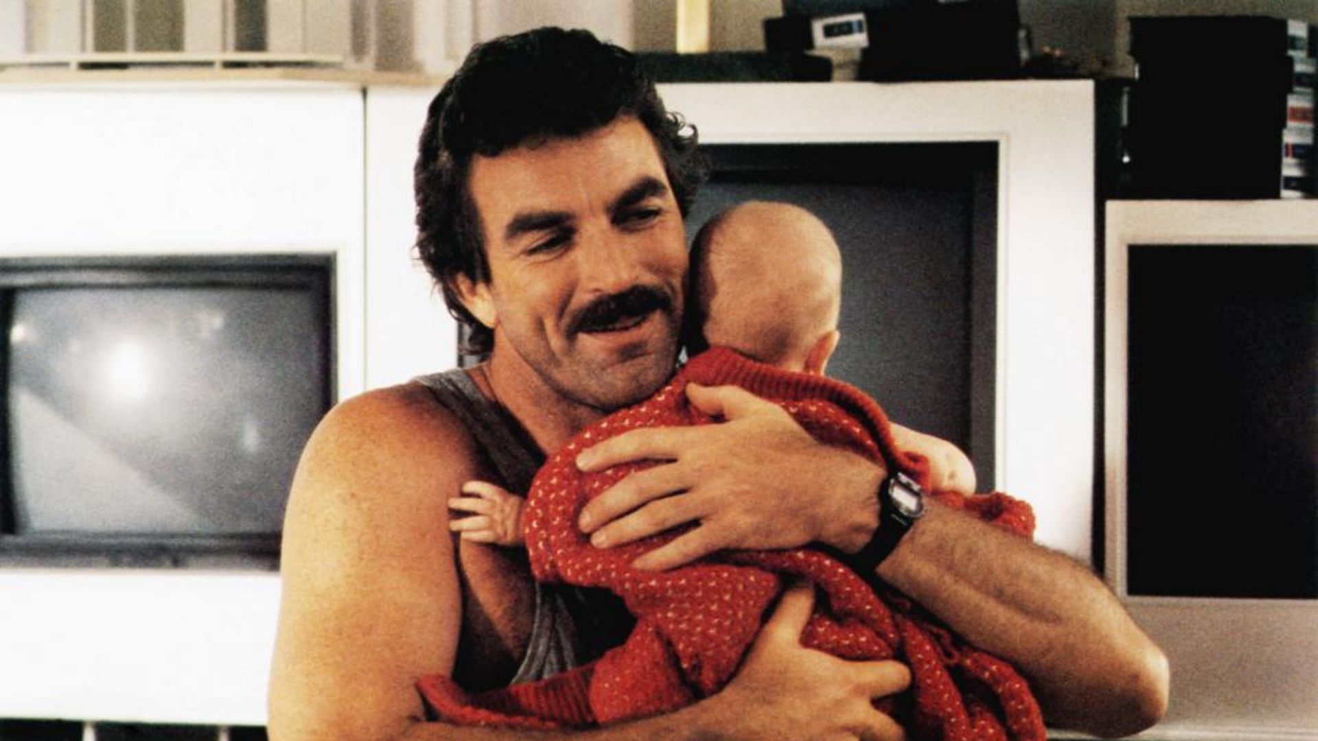 Tom Selleck in &#039;Three Men and a Baby&#039; (Image via Disney)