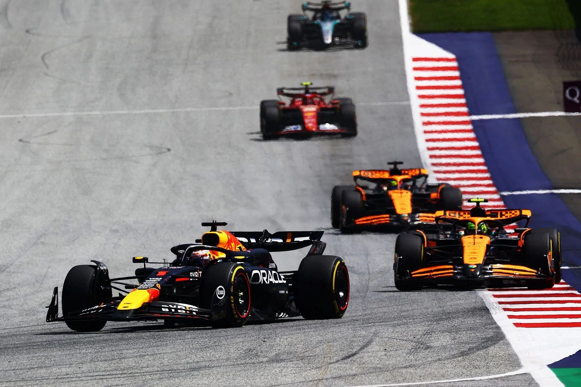 Max Verstappen (1) leads Lando Norris (4) during the Sprint ahead of the 2024 F1 Austrian Grand Prix. (Photo by Mark Thompson/Getty Images)