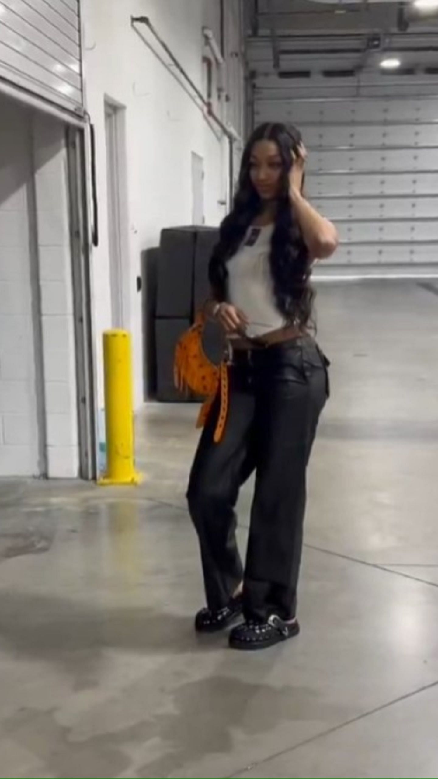 Reese posed in front of the camera with her pregame outfit (via WNBA X)