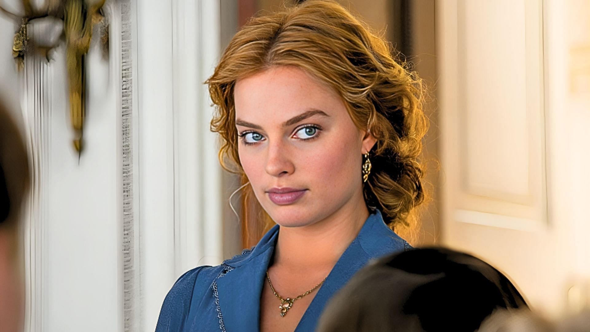 Margot Robbie has not expressed interest in portraying Elsa in a live-action Frozen movie (Image via Jonathan Olley - &copy; 2014 Warner Bros. Entertainment Inc., WV Films IV LLC and Ratpac-Dune Entertainment LLC--U.S., Canada, Bahamas &amp; Bermuda)