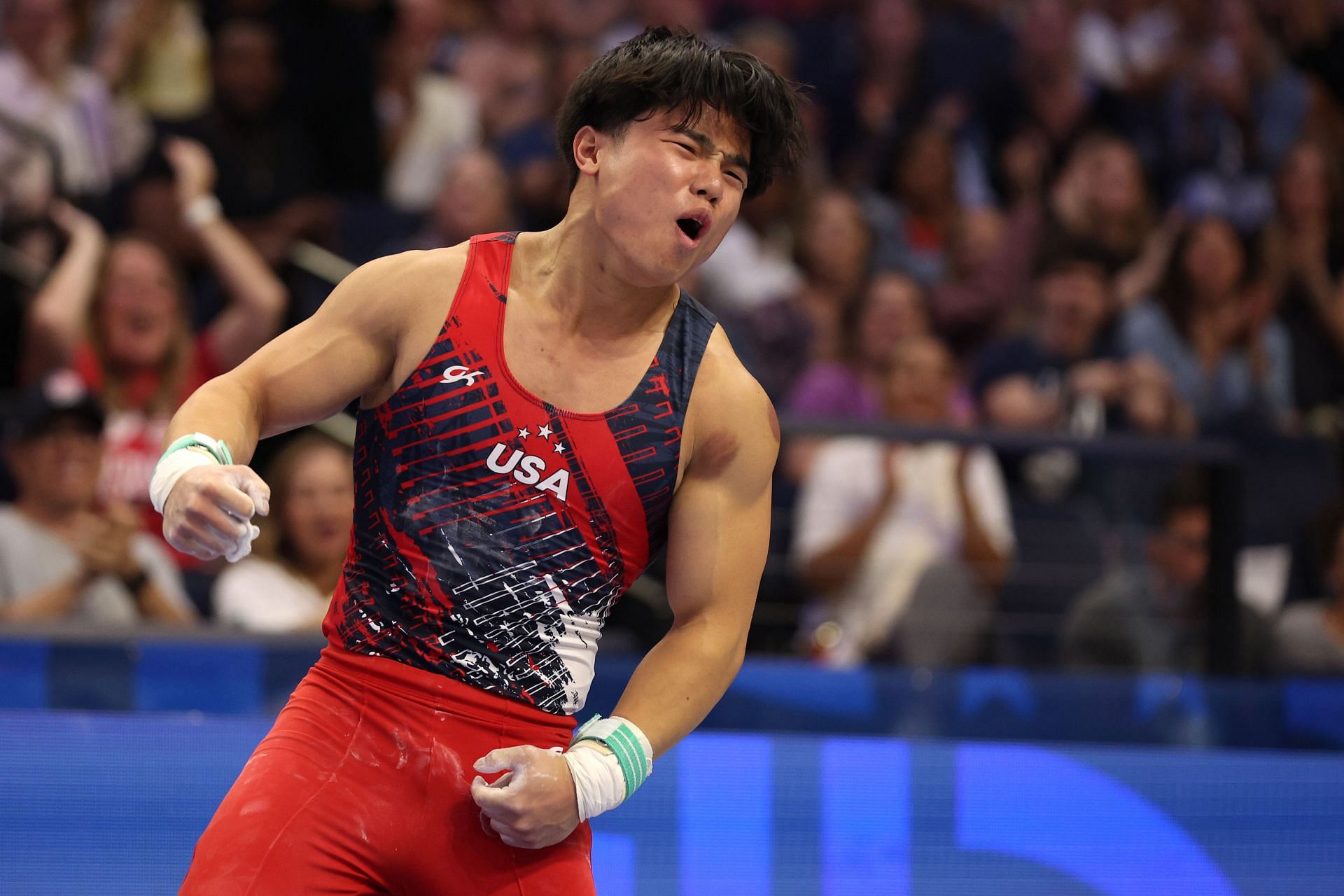 Asher Hong celebrates after competing in the floor exercise on Day Three of the 2024 U.S. Olympic Team Gymnastics Trials at Target Center in Minneapolis, Minnesota. (Photo by Getty Images)