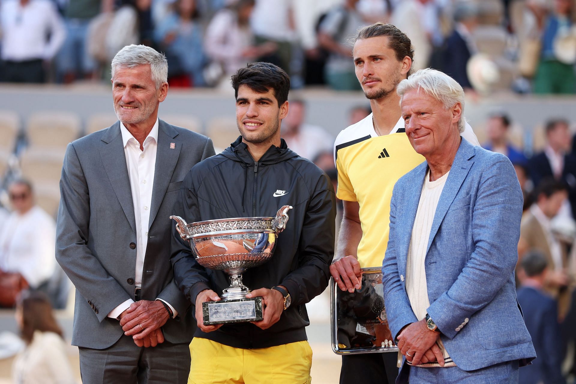 Carlos Alcaraz with the 2024 French Open trophy