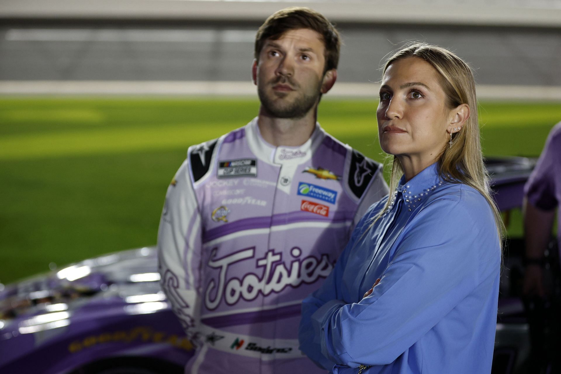 &lt;a href=&#039;https://www.sportskeeda.com/go/nascar-cup-series&#039; target=&#039;_blank&#039; rel=&#039;noopener noreferrer&#039;&gt;NASCAR&lt;/a&gt; Cup Series 65th Annual Daytona 500 - Busch Light Pole Qualifying DAYTONA BEACH, FLORIDA - FEBRUARY 15: Julia Piquet and Daniel Suarez, driver of the #99 Tootsies Orchid Lounge Chevrolet, look on during qualifying for the Busch Light Pole at Daytona International Speedway on February 15, 2023 in Daytona Beach, Florida. (Photo by Sean Gardner/Getty Images)