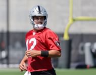 Aidan O'Connell runs through a drill during an OTA offseason workout (image credit: Getty)