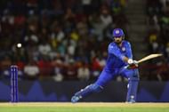 Mohammad Nabi of Afghanistan bats during the ICC Men's T20 Cricket World Cup West Indies & USA 2024 match between West Indies and Afghanistan at Daren Sammy National Cricket Stadium on June 17, 2024 in Gros Islet, Saint Lucia. (Photo by Robert Cianflone/Getty Images).