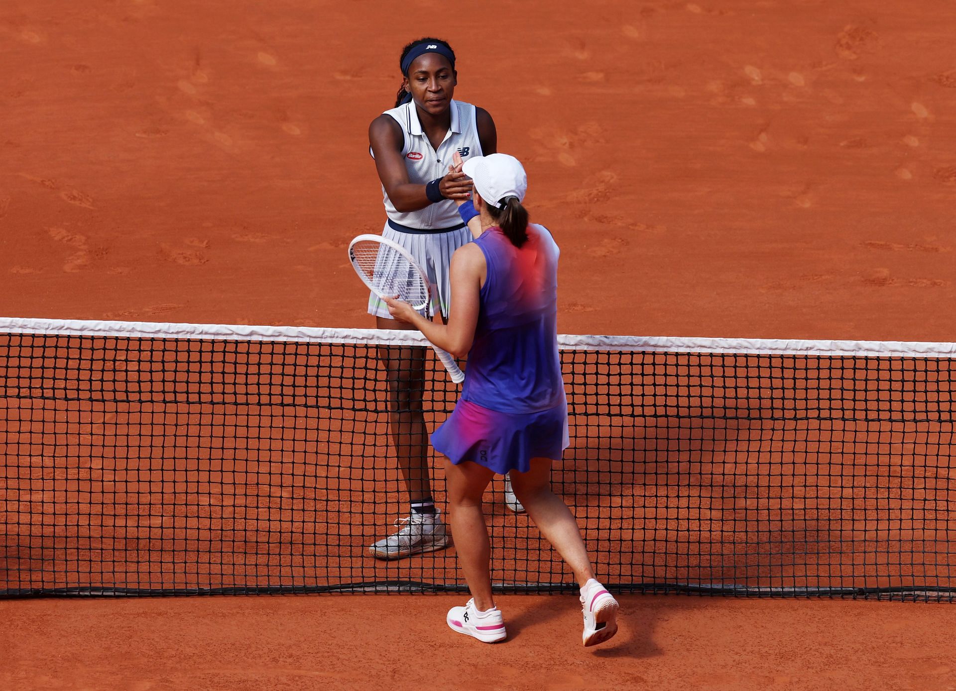 Coco Gauff and Iga Swiatek pictured at the 2024 French Open 