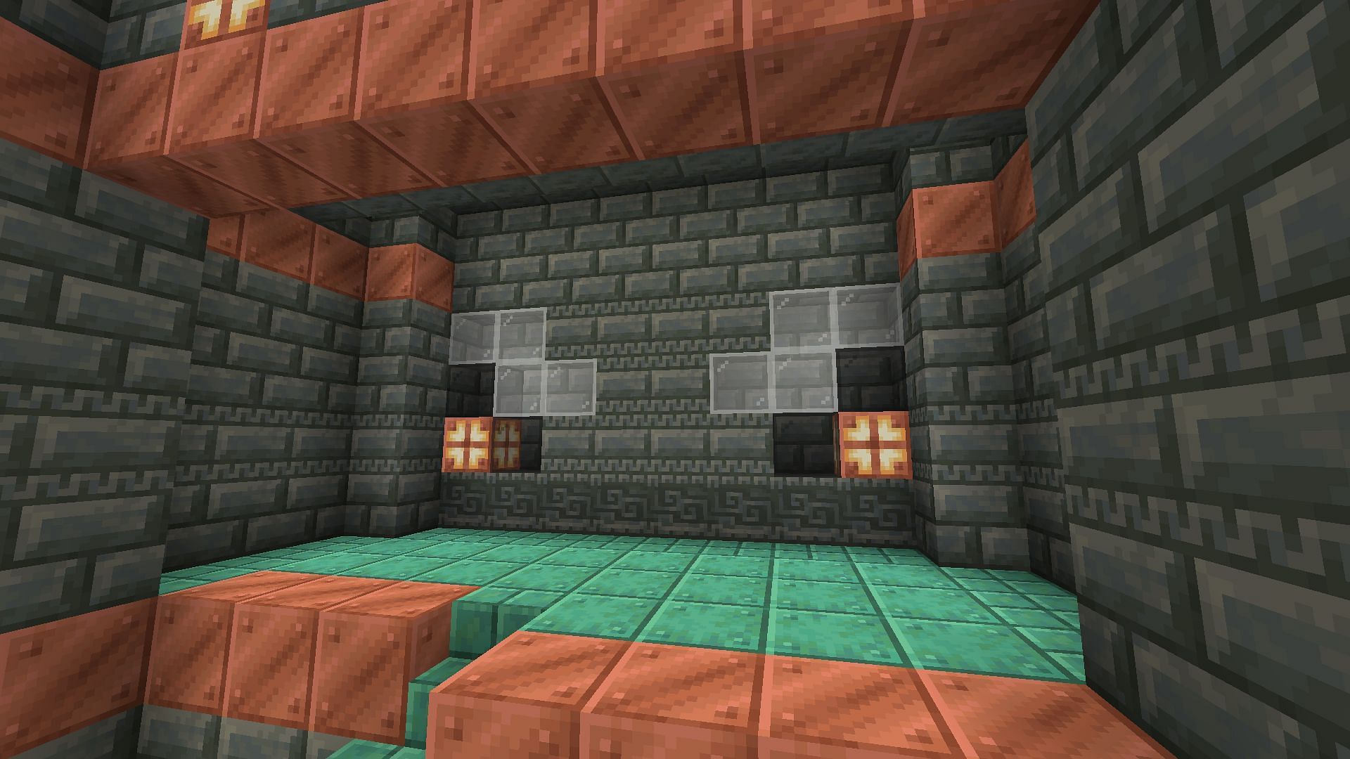 The breeze face found on the trial chamber&#039;s wall (Image via Mojang)