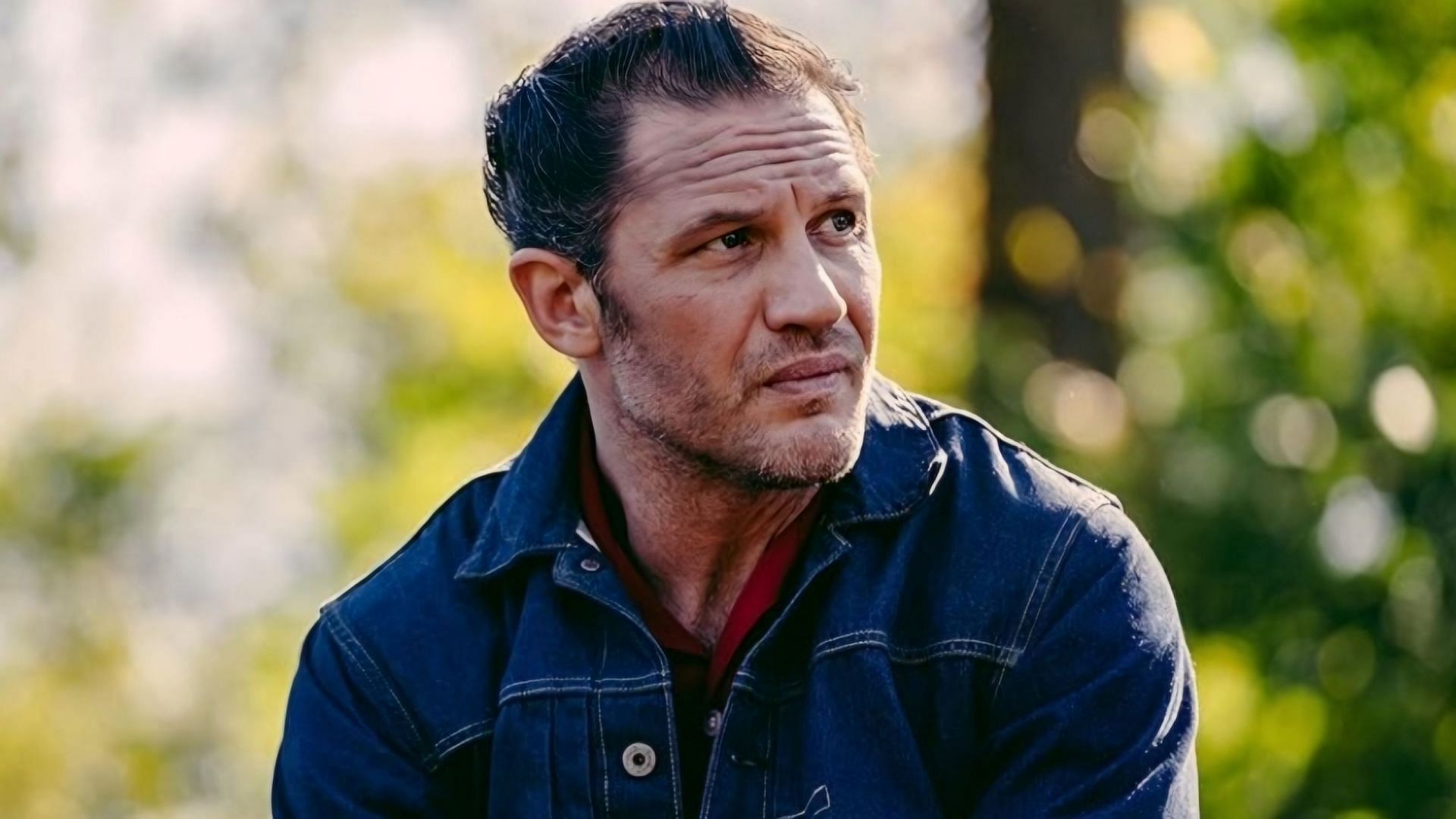 Tom Hardy as Johnny in a scene from The Bikeriders (Image via Focus Features)