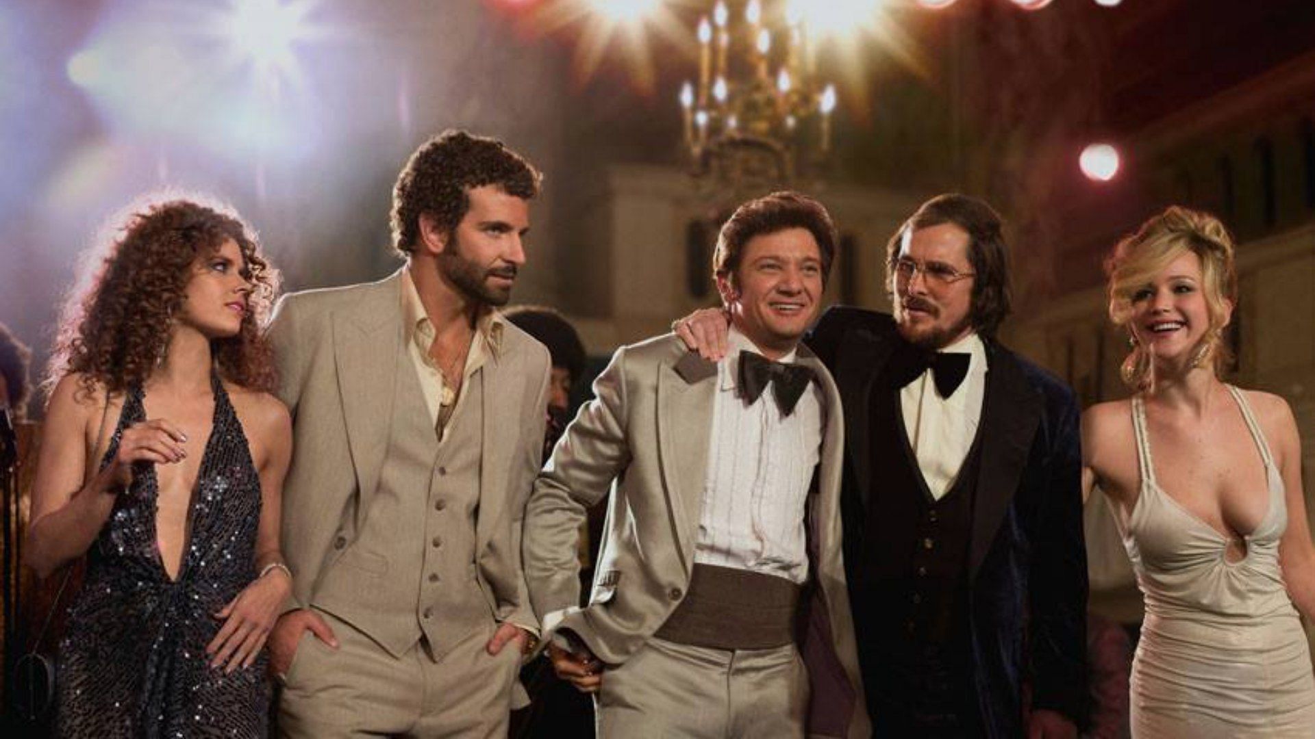 A still from the movie American Hustle starring Christian Bale (Image via Facebook/American Hustle)
