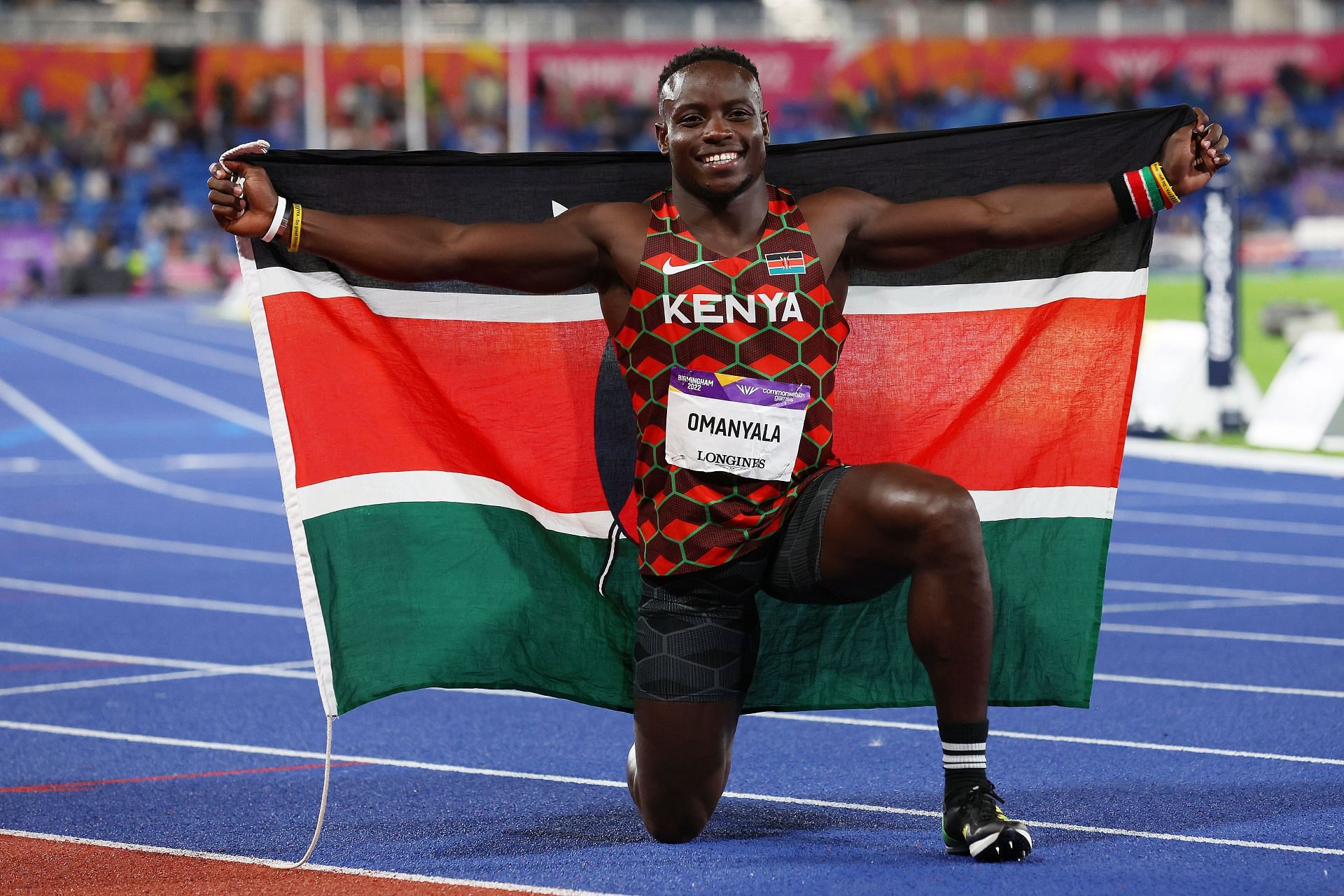 Ferdinand Omanyala of Team Kenya celebrates with their countries flag after winning the Gold medal in the Men&#039;s 100m Final on day six of the Birmingham 2022 Commonwealth Games at Alexander Stadium on August 03, 2022 in Birmingham, England. (Photo by Al Bello/Getty Images)