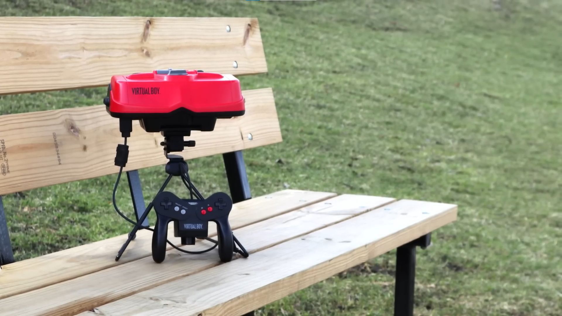 Virtual Boy sitting on a bench (Image via FrameRater/YouTube)