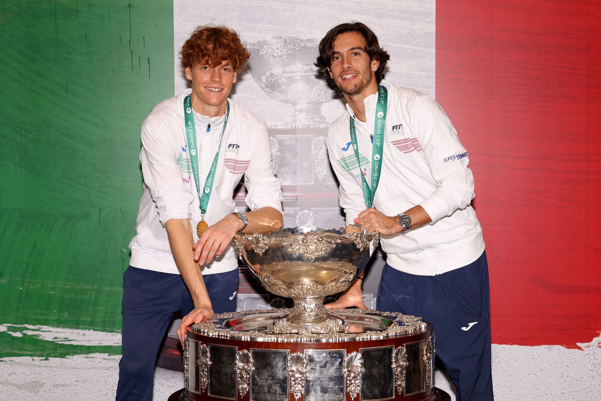 Jannik Sinner and Lorenzo Musetti with the Davis Cup (Image source: Getty)