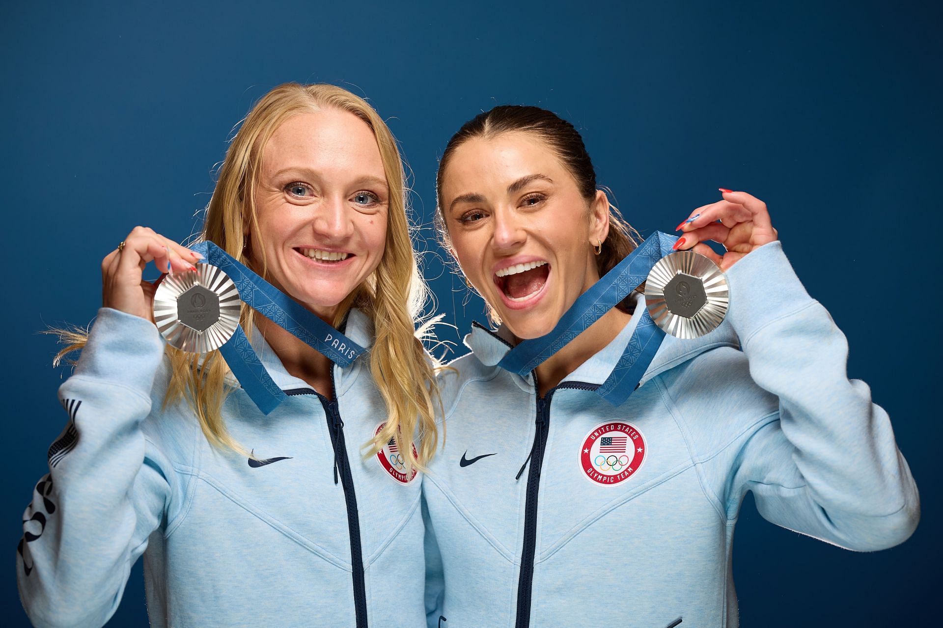 Sarah Bacon and Kassidy Cook pose for a photo at the USA House Paris in France. (Photo by Getty Images)