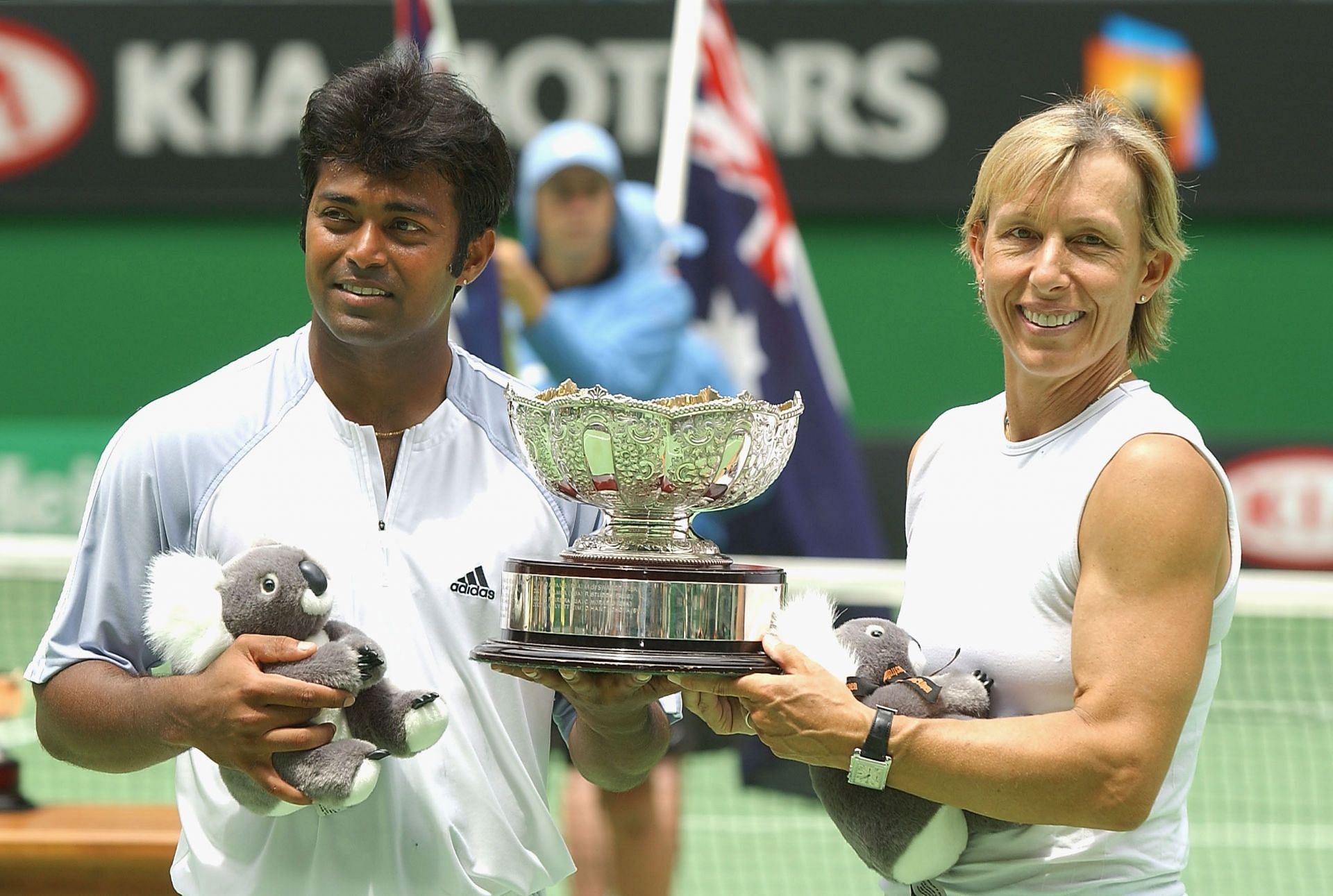 Martina Navratilova and Leander Paes with the 2003 Australian Open trophy [GETTY]