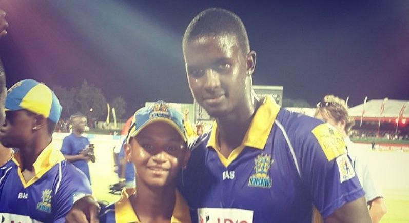 Jason Holder with his Barbados Tridents (now Barbados Royals) teammate Shane Dowrich after winning the CPL 2014 (Image Credits: Jason Holder&#039;s Instagram)