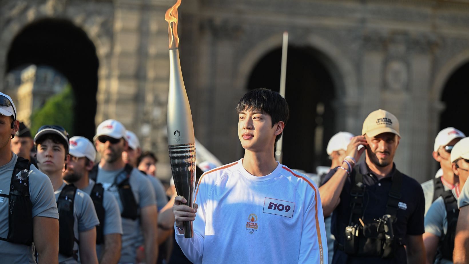 BTS Jin chosen directly by the International Olympic Committee as the torchbearer. (Images via X/@Paris2024)